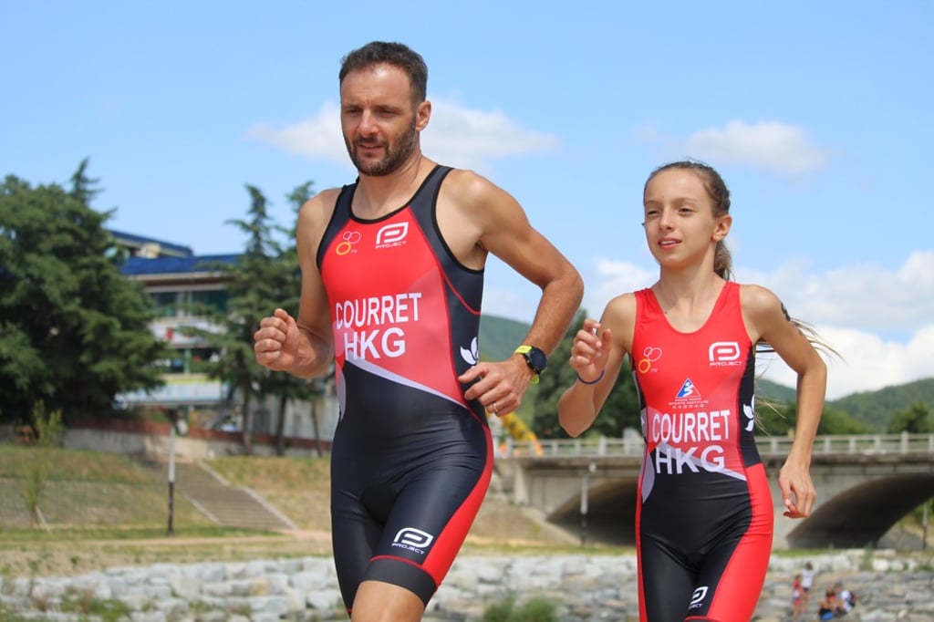Olivier Courret with his daughter Pauline at the 2019 Asia Triathlon Championship.