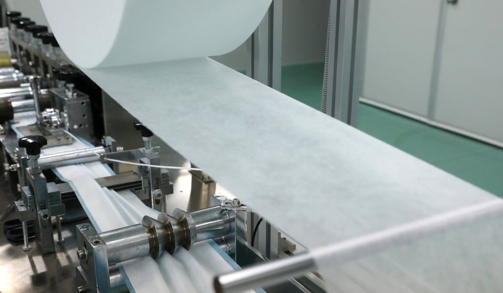 Masks being produced at a factory in Tuen Mun. Photo: K.Y. Cheng