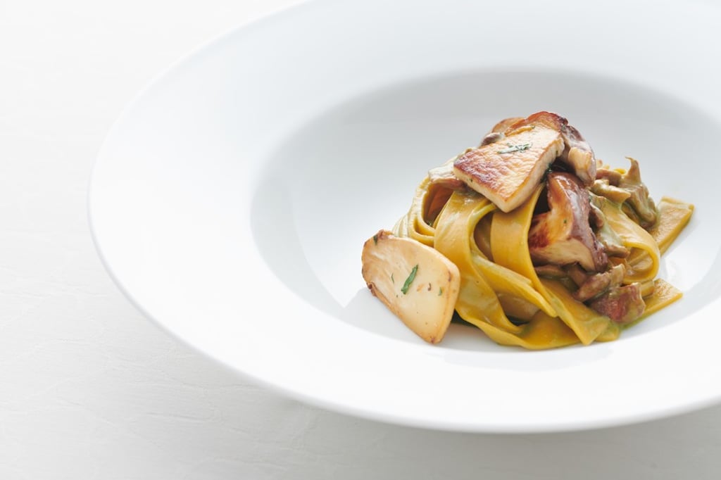 Home-made tagliatelle with roasted mushrooms and herbs. Home-made tagliatelle with roasted mushrooms and herbs.