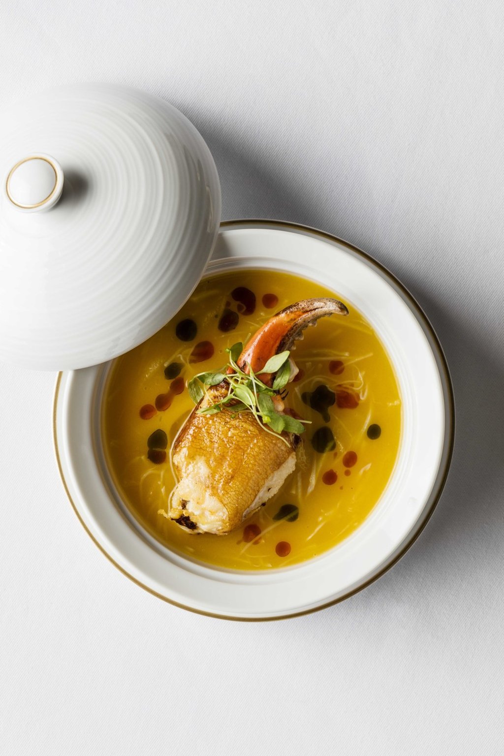 Hot and sour crab claw with chicken egg custard. Hot and sour crab claw with chicken egg custard.