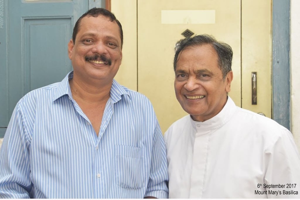 Former alcoholic Bosco Dsouza (left) with Father Joe.