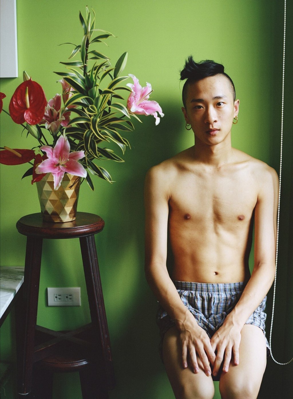 Ni Feiya in an image from Chinese photographer Luo's new series, titled “Youth”. His “double life” defines his identity and social interactions. Photo: Luo Yang