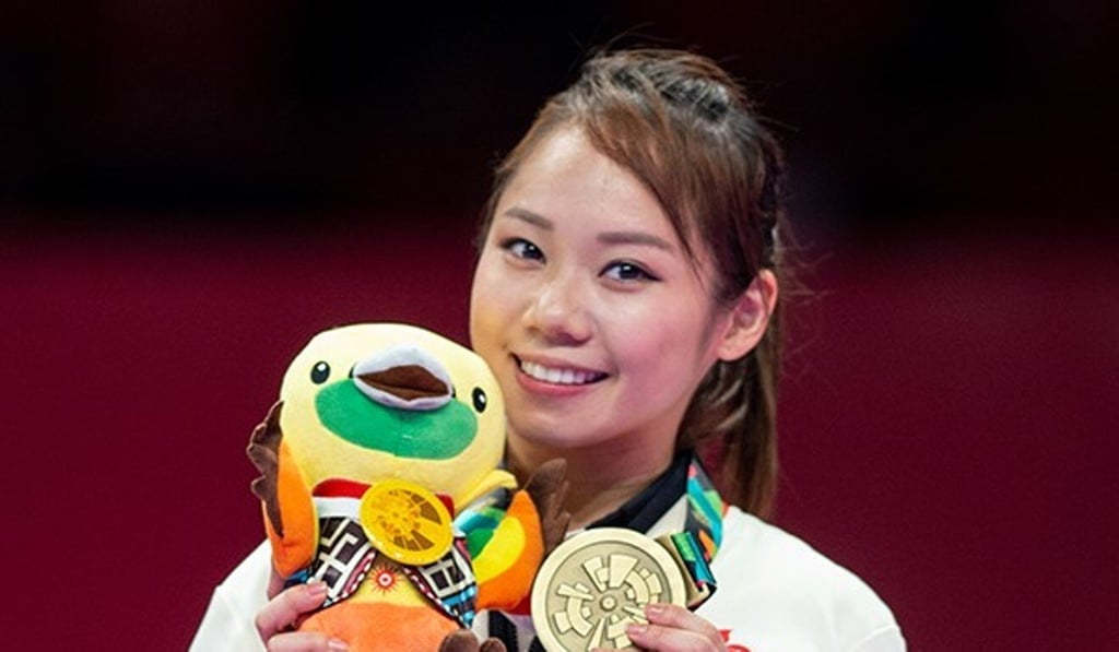 Karate player Grace Lau Mo-sheung with her Asian Games bronze medal. Photo: Hong Kong Olympic Committee