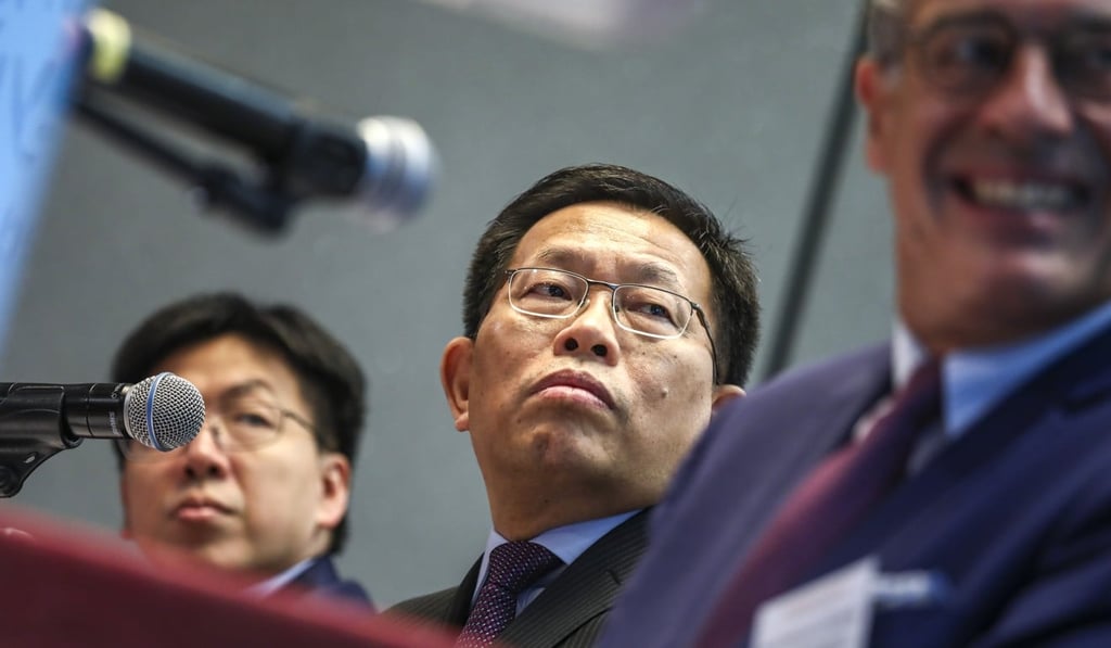 Qian Jiannong (centre), chairman and chief executive of Fosun Tourism Group, said the company is coping well with the coronavirus crisis. Photo: Jonathan Wong