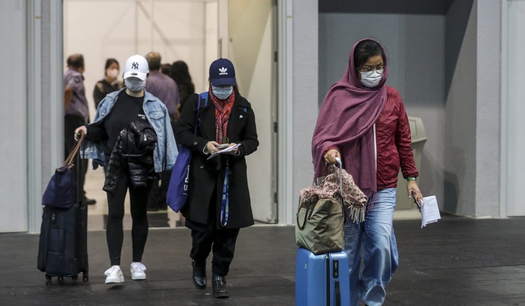 Arrivals into Hong Kong leave a testing facility near the airport at AsiaWorld-Expo as the government ramps up anti-contagion measures on another record day in the city for new infections. Photo: Winson Wong Arrivals into Hong Kong leave a testing facility near the airport at AsiaWorld-Expo as the government ramps up anti-contagion measures on another record day in the city for new infections. Photo: Winson Wong