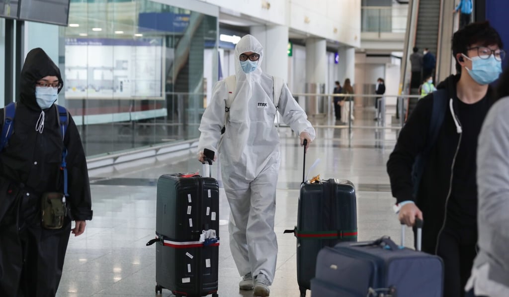 Travellers arrive at Hong Kong International Airport amid the coronavirus pandemic. Photo: Xiaomei Chen