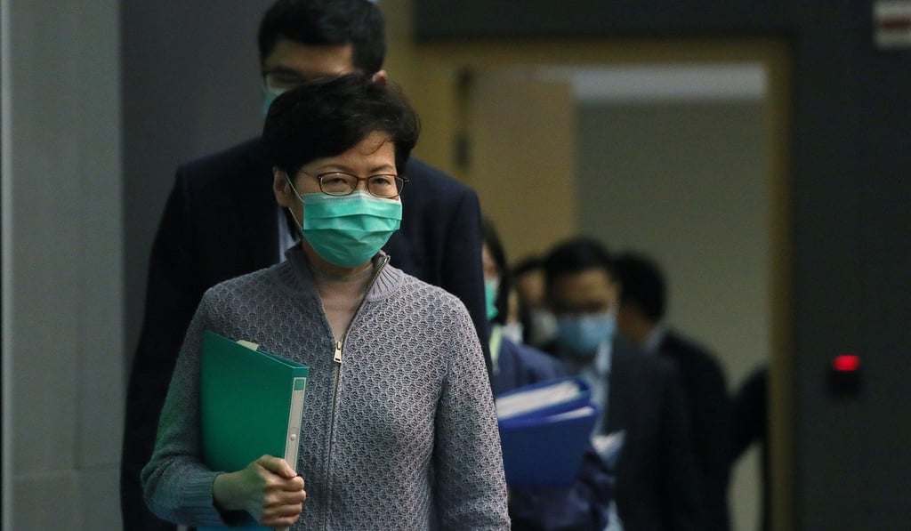 Carrie Lam attends Saturday’s press conference wearing a mask. Photo: Xiaomei Chen