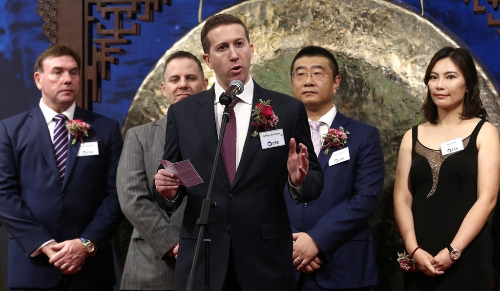 Jeffrey Perlman, the chairman of ESR Cayman, centre, at the company’s listing ceremony in Hong Kong in November last year. Photo: Jonathan Wong