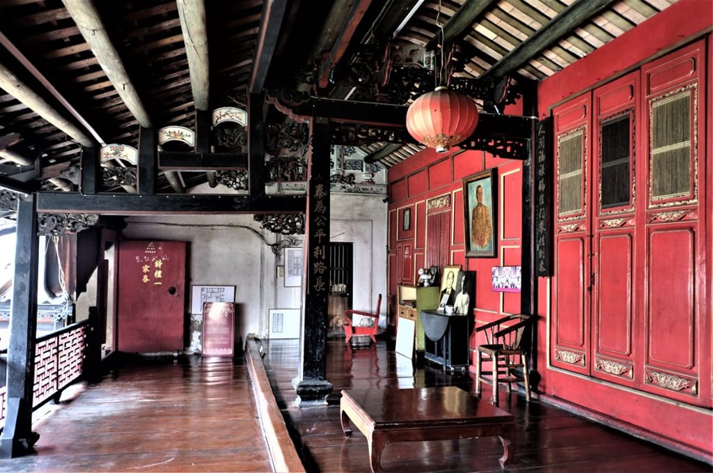 The interior of a hall on an upper-floor veranda of the So Heng Tai Mansion in Bangkok. Photo: Tibor Krausz