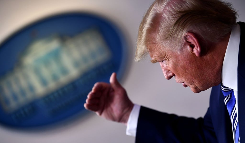 US President Donald Trump invoked the statute last week as his administration broadened its response to the pandemic, but he had resisted activating it until now. Photo: AFP US President Donald Trump invoked the statute last week as his administration broadened its response to the pandemic, but he had resisted activating it until now. Photo: AFP