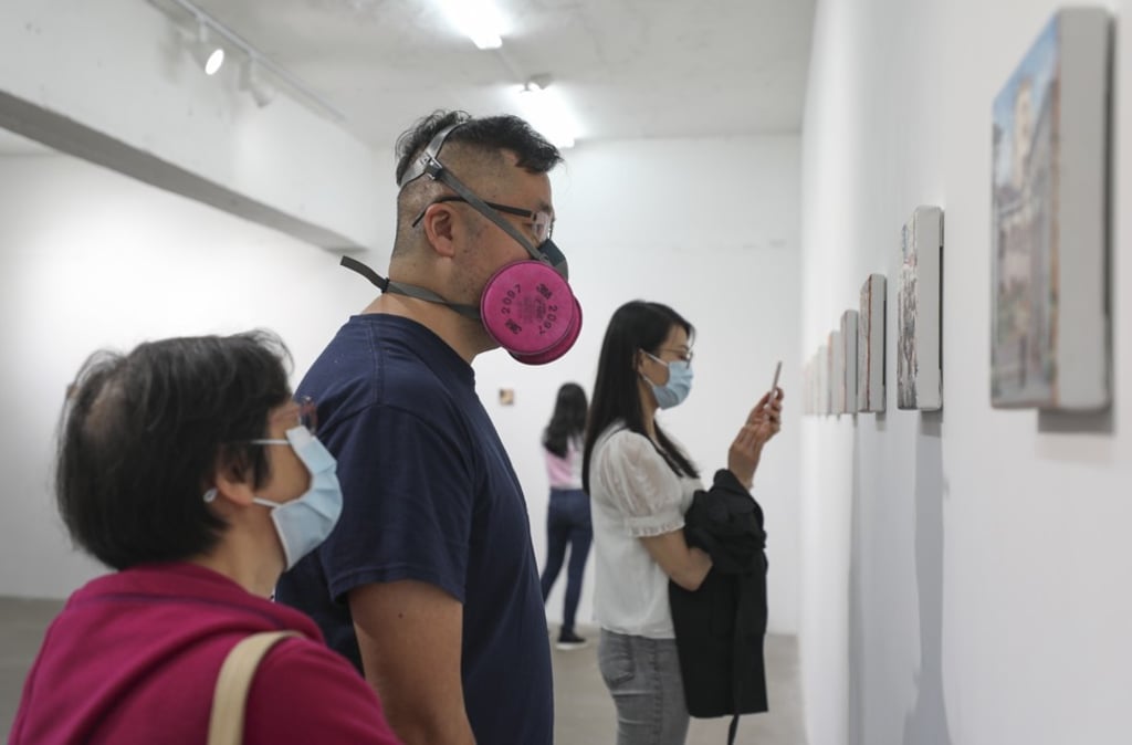 Visitors at Chow Chun-fai’s exhibition opening at Gallery Exit, earlier this month. Photo: Chen Xiaomei