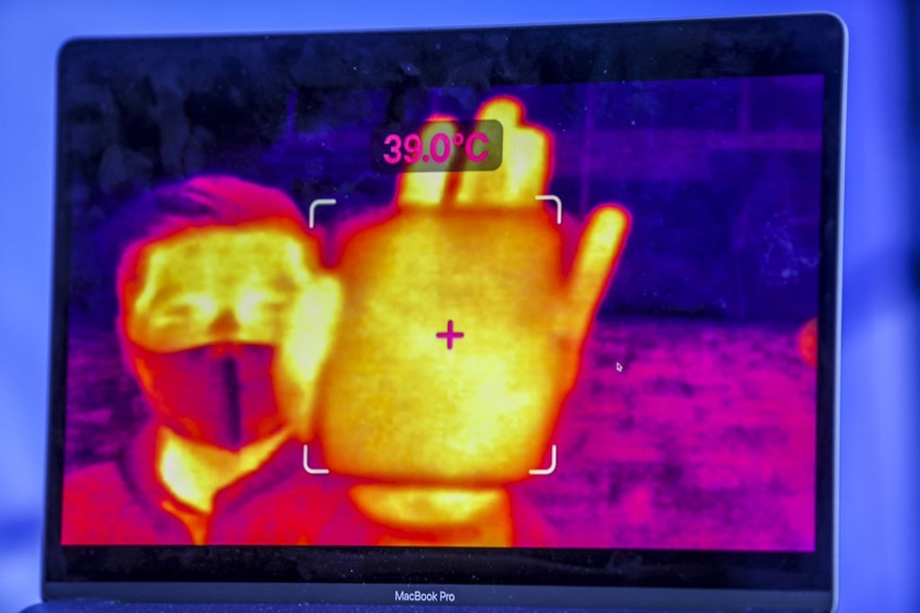 Each smart glass user at Hongyuan Park can record the infrared image and temperature reading of a person up to a distance of 1 metre, according to artificial intelligence start-up Rokid, developer of the non-contact thermal augmented reality device. Photo: Handout Each smart glass user at Hongyuan Park can record the infrared image and temperature reading of a person up to a distance of 1 metre, according to artificial intelligence start-up Rokid, developer of the non-contact thermal augmented reality device. Photo: Handout