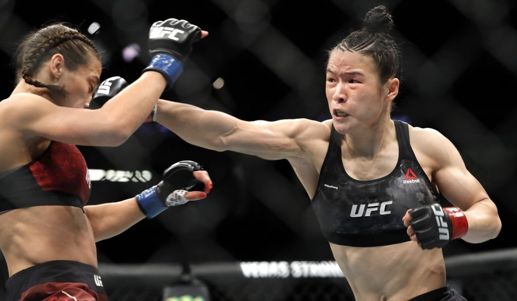 Zhang punches former champion Jedrzejczyk. Photo: AP