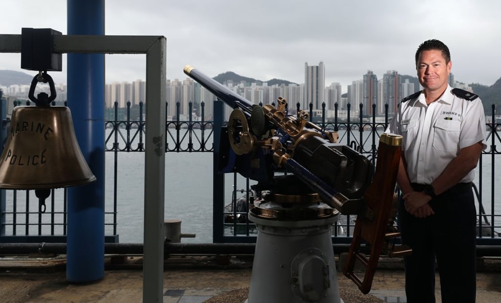 Superintendent Tim Worrall with Hong Kong’s original Noon Day Gun at the Marine Police Headquarters. Photo: Xiaomei Chen