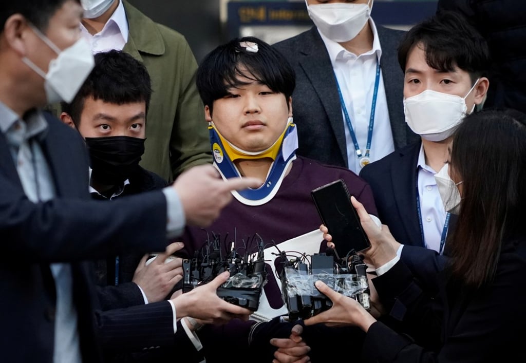 Cho Joo-bin, the main administrator of the ‘Nth Room’ Telegram group, walks out of a police station as he is transferred to a prosecutor’s office in Seoul, South Korea, on March 25. Photo: Reuters