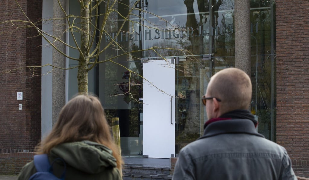 The glass door was smashed during a break-in at the Singer Laren museum in the Netherlands. Photo: AP