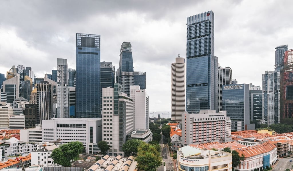 Only about 40 per cent of workers in Singapore’s Central Business District are following social distancing guidelines. Photo: Bloomberg