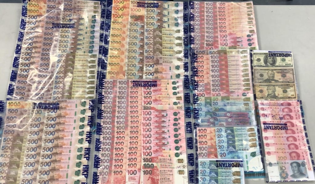 Some of the gambling syndicate’s money seized by police. Photo: Handout Some of the gambling syndicate’s money seized by police. Photo: Handout