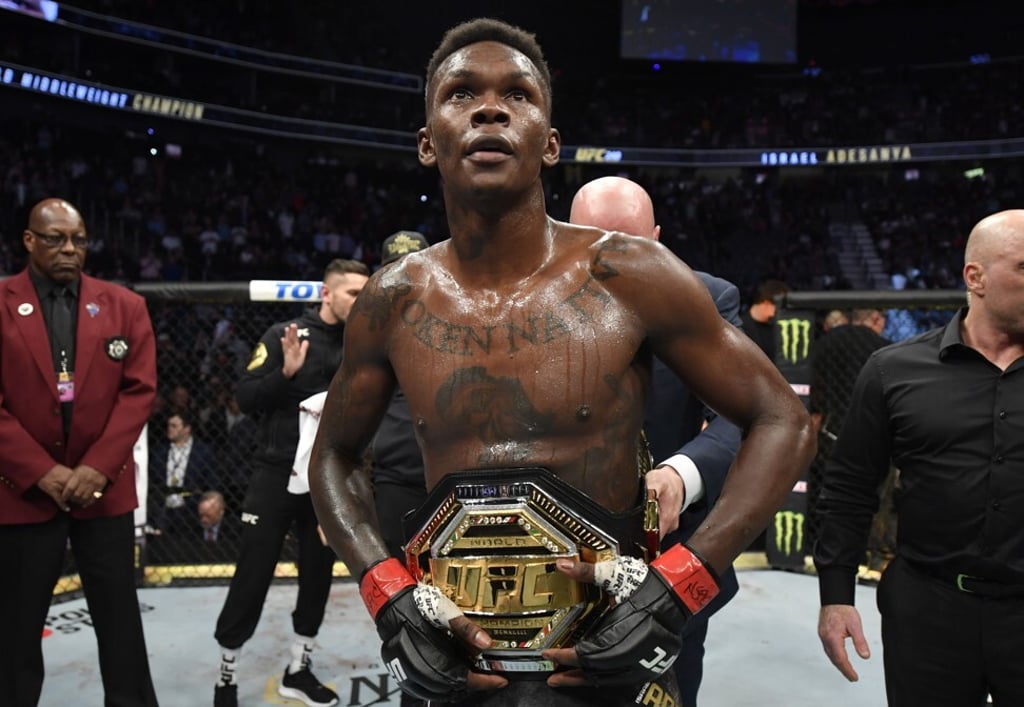 Israel Adesanya celebrates after defeating Yoel Romero at UFC 248. Photo: Jeff Bottari/Zuffa LLC