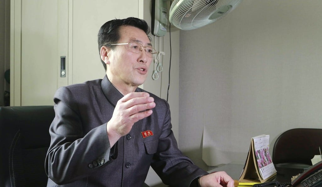 North Korean official Pak Myong Su speaks during an interview at his office, saying the country has no coronavirus cases. Photo: AP
