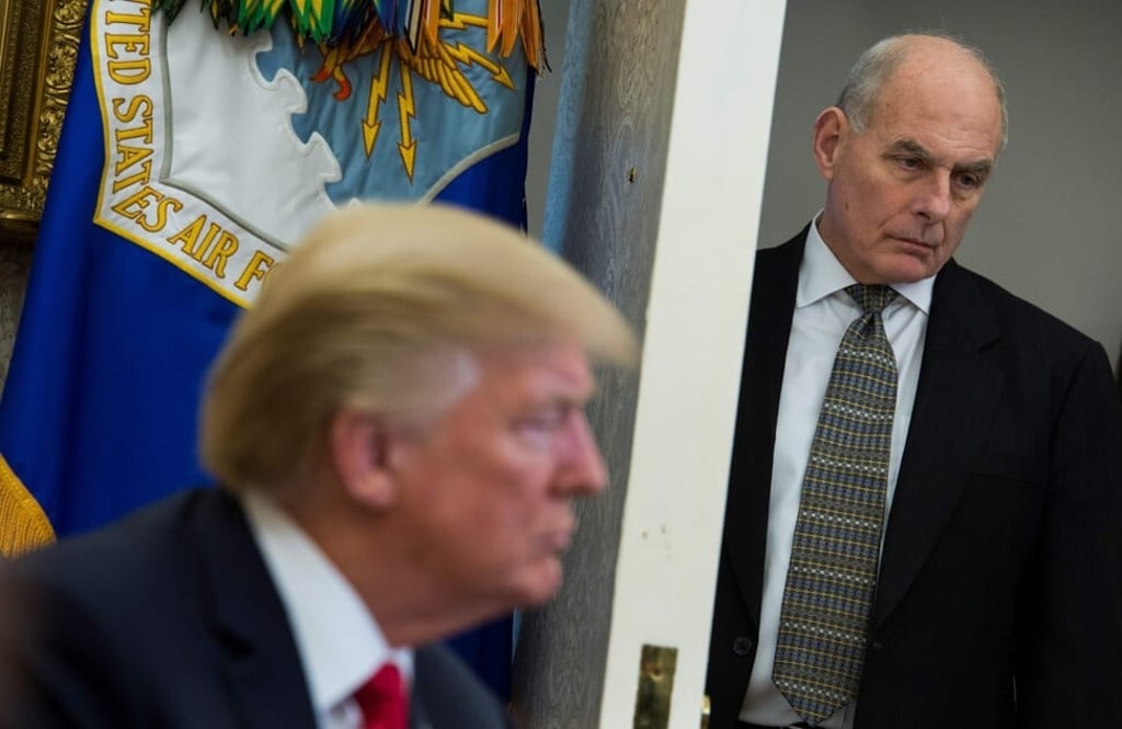 Then White House chief of staff John Kelly looks on as US President Donald Trump meets with North Korean defectors in the Oval Office at the White House on December 8, 2018. Photo: AFP