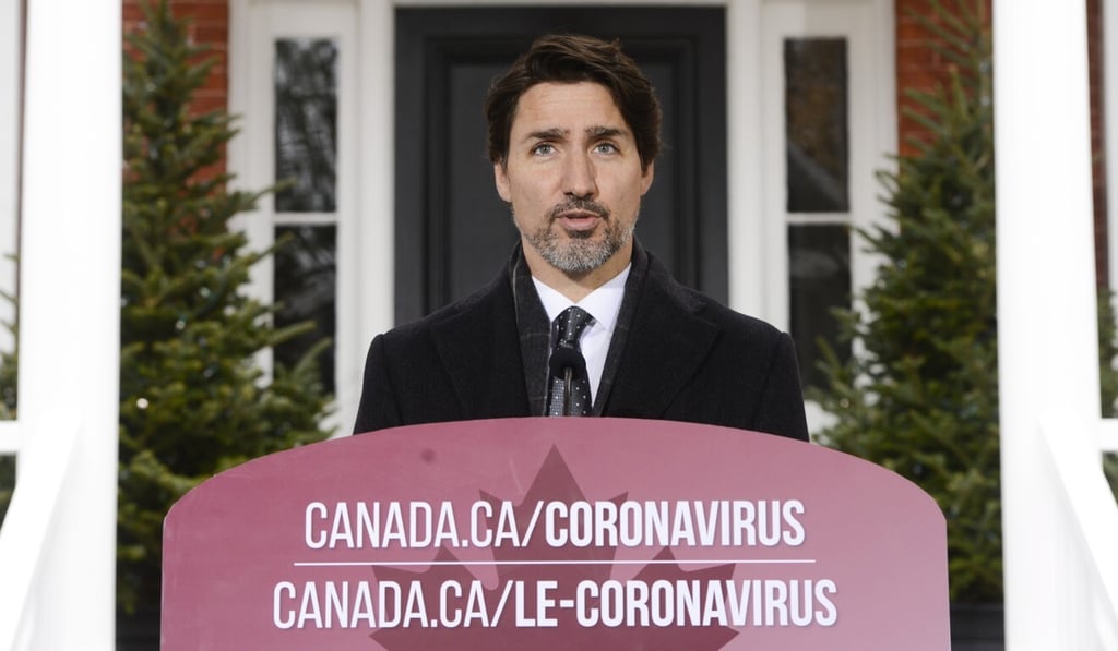 Canadian Prime Minister Justin Trudeau addresses the nation about the pandemic on Friday. Photo: The Canadian Press via AP) Canadian Prime Minister Justin Trudeau addresses the nation about the pandemic on Friday. Photo: The Canadian Press via AP)
