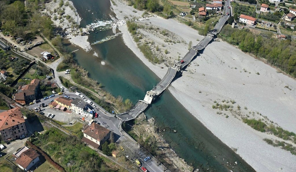 A van was hit by falling masonry and the driver was taken to hospital with slight injuries after the bridge collapsed in Tuscany on Wednesday. Photo: Guardia di Finanza Press Office via EPA-EFE A van was hit by falling masonry and the driver was taken to hospital with slight injuries after the bridge collapsed in Tuscany on Wednesday. Photo: Guardia di Finanza Press Office via EPA-EFE