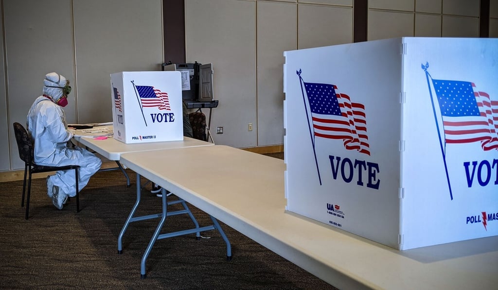 Elections chief inspector Mary Magdalen Moser runs a polling station in Kenosha, Wisconsin, in hazmat gear as the Wisconsin primary kicks off on April 7 despite the coronavirus pandemic. Photo: AFP Elections chief inspector Mary Magdalen Moser runs a polling station in Kenosha, Wisconsin, in hazmat gear as the Wisconsin primary kicks off on April 7 despite the coronavirus pandemic. Photo: AFP