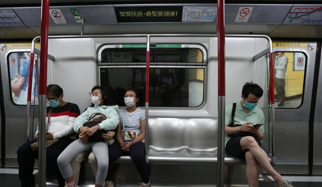Passengers maintain physical distancing on the Kwun Tong MTR line. Photo: Jonathan Wong