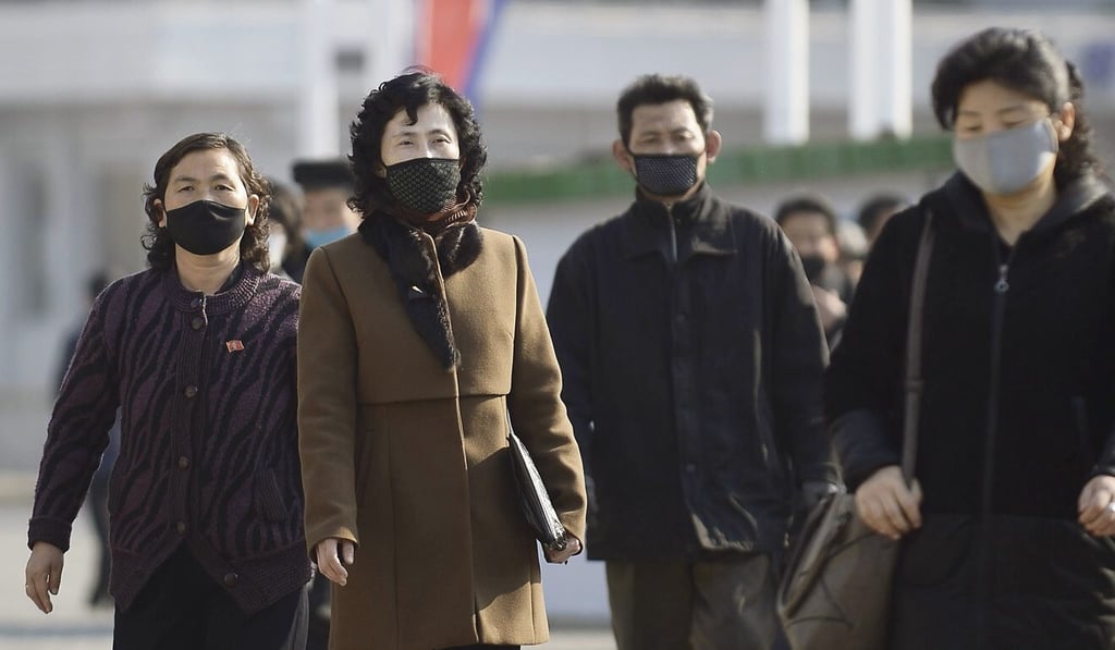 People wear face masks in Pyongyang. Photo: Kyodo People wear face masks in Pyongyang. Photo: Kyodo