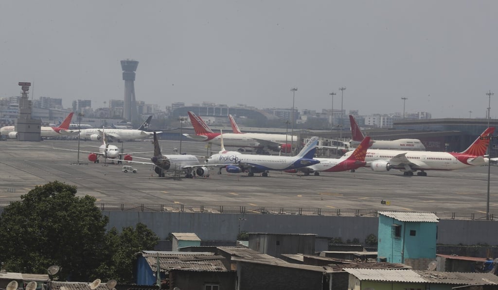 Planes are parked on a runway at the Chhatrapati Shivaji domestic airport in Mumbai, India, during the coronavirus lockdown and travel restrictions. Photo: AP Planes are parked on a runway at the Chhatrapati Shivaji domestic airport in Mumbai, India, during the coronavirus lockdown and travel restrictions. Photo: AP