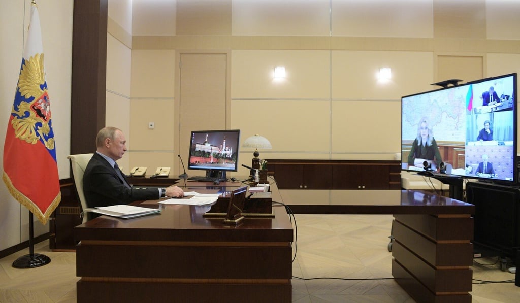 Russian President Vladimir Putin in a videoconference with officials. Photo: EPA