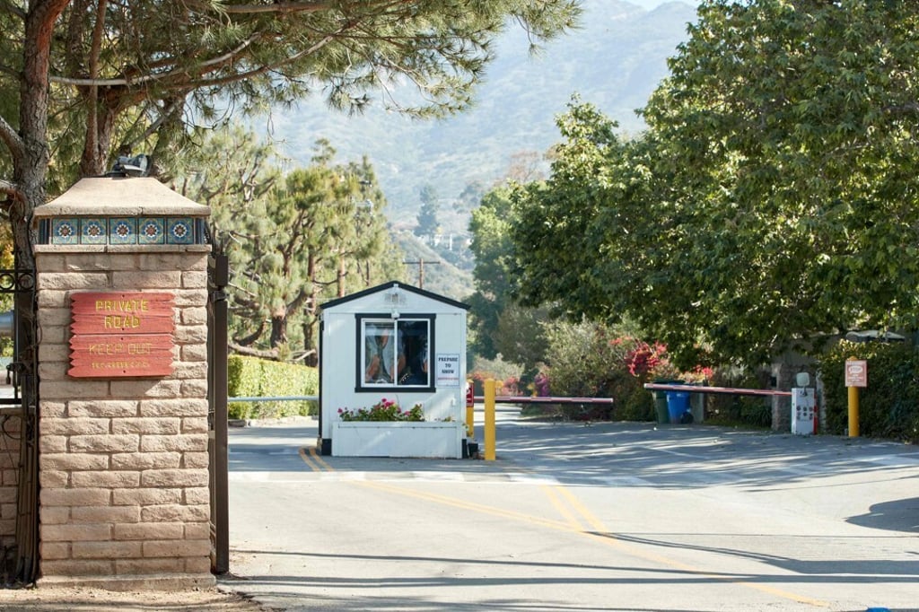 The entrance of the gated neighbourhood Serra Retreat in Malibu, long favoured by A-listers and movie moguls. Photo: AFP