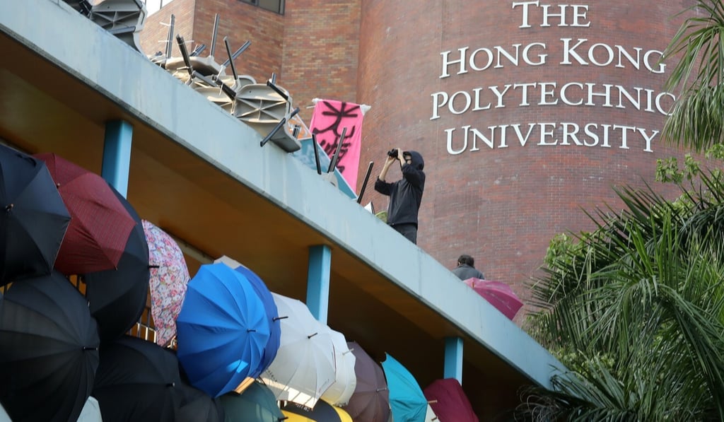 Anti-government protesters barricading themselves at the university campus in Hung Hom. Photo: Dickson Lee