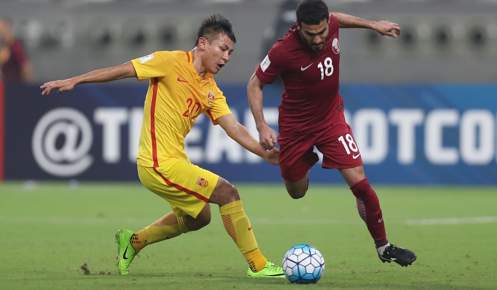 Yu Hanchao in action against Qatar in the 2018 World Cup qualifiers. Photo: AFP