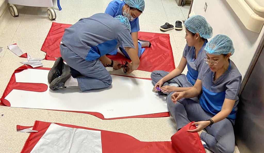 Designers Adrian Pe and Ram Silva have come up with fun and colourful suits to lift the spirits of medical workers. Designers Adrian Pe and Ram Silva have come up with fun and colourful suits to lift the spirits of medical workers.