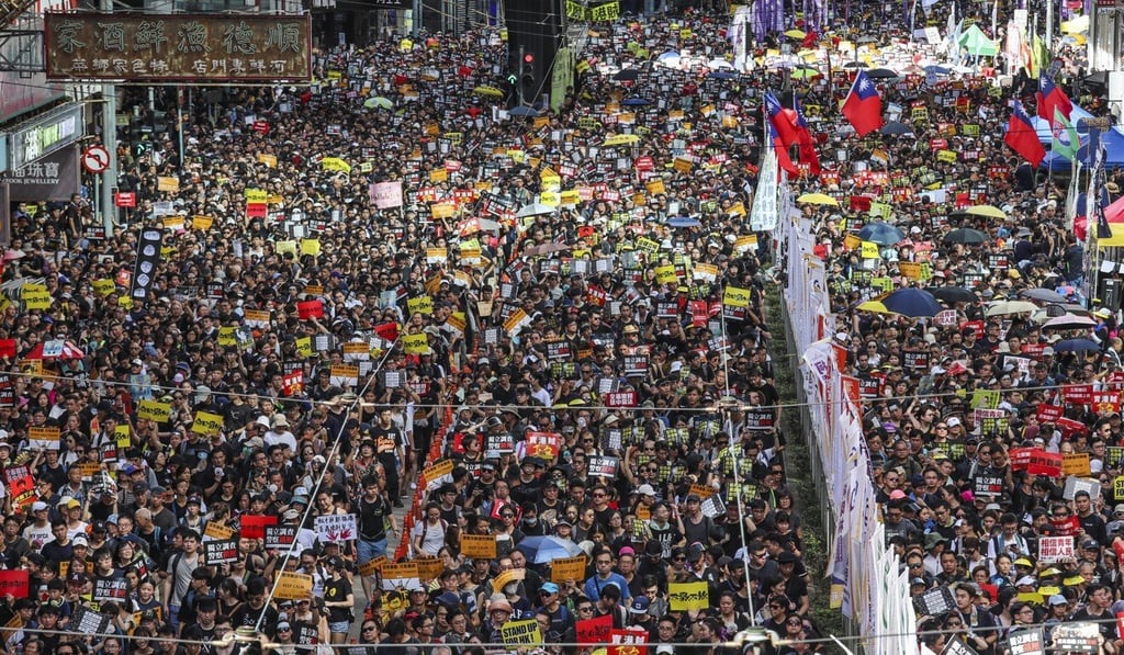Protesters march in Hong Kong on July 1, 2019. Photo: Felix Wong