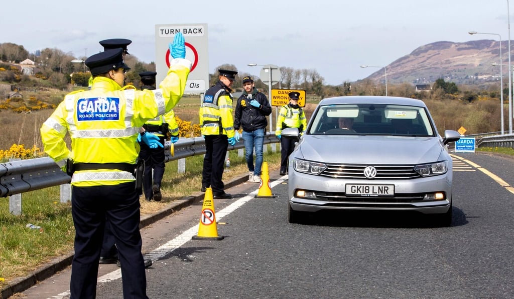 Irish police stop and check vehicles at a border crossing at Carrkcarnon, County Louth, Ireland on April 9, 2020. Photo: AFP Irish police stop and check vehicles at a border crossing at Carrkcarnon, County Louth, Ireland on April 9, 2020. Photo: AFP
