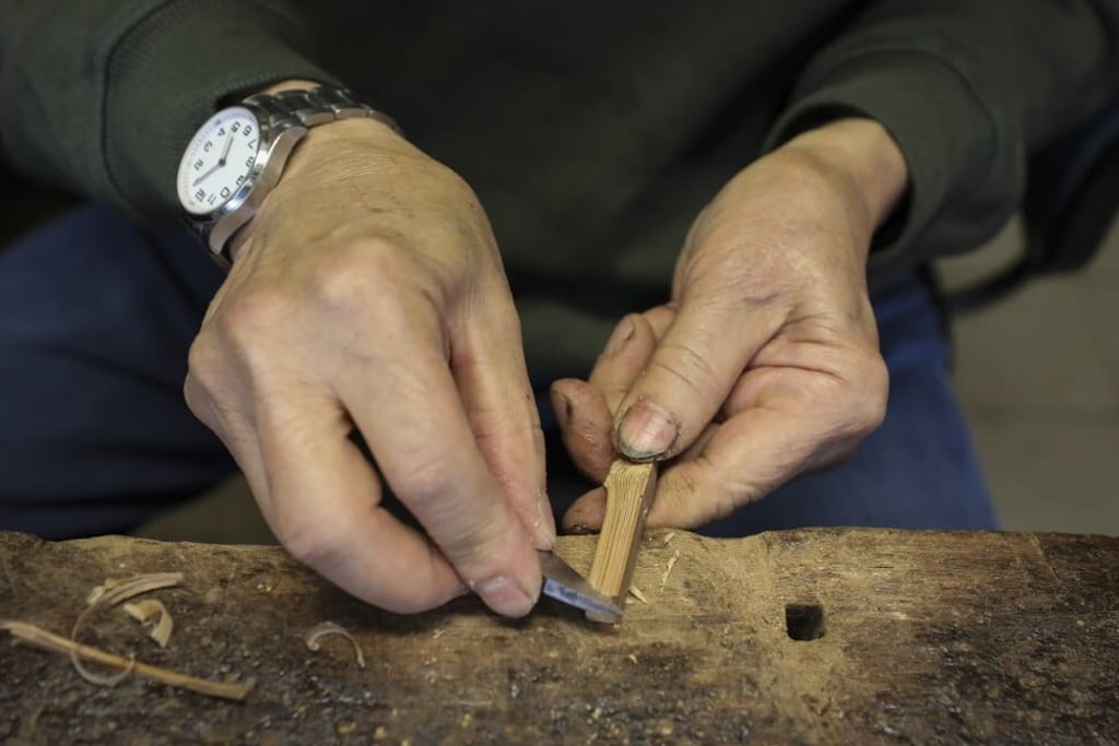 Chan works with bamboo. Photo: SCMP / James Wendlinger