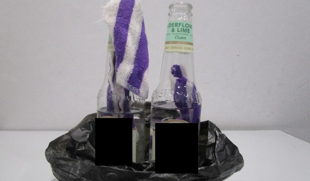 Two petrol bombs were found in a 21-year-old man’s bag. The incident has been linked to the arrest of an officer. Photo: Handout