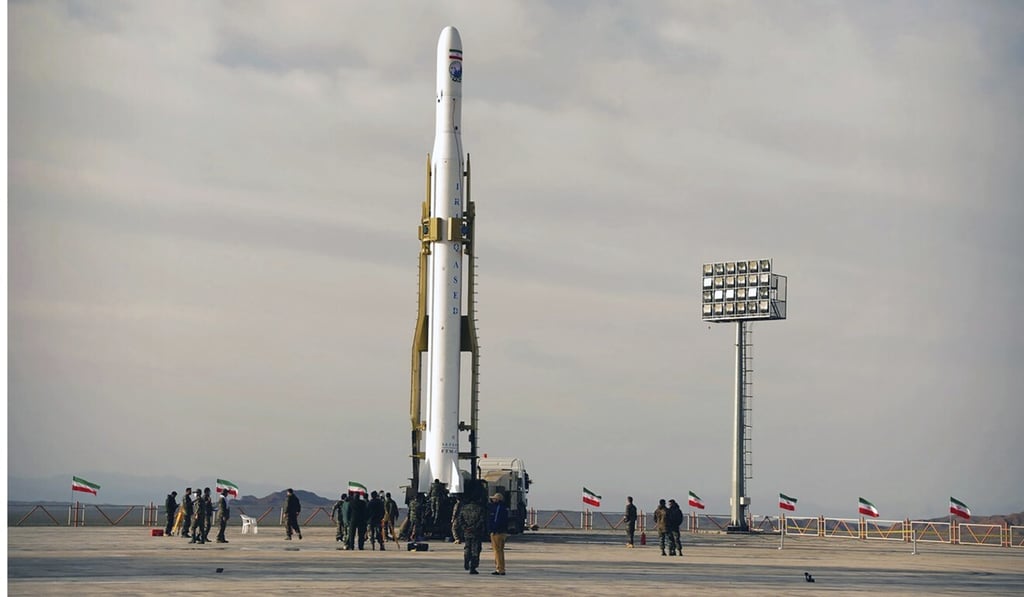 An Iranian rocket carrying a satellite is prepared for launch. Photo: AP