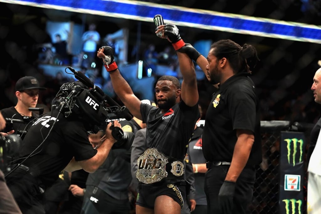 Tyron Woodley celebrates a win over Demian Maia at UFC 214. Photo: AFP