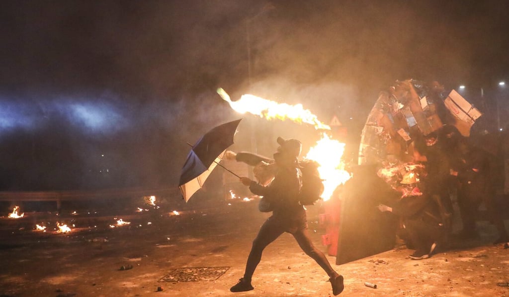 Clashes break out between riot police and students at Chinese University in Sha Tin. Photo: Sam Tsang