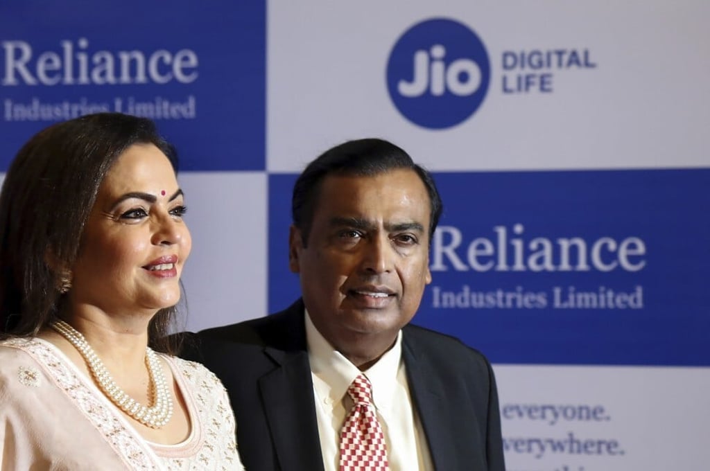 Mukesh Ambani, chairman of Reliance Industries, with his wife Neeta Ambani arriving for the company’s annual general meeting in Mumbai, India, last August. Photo: AP Mukesh Ambani, chairman of Reliance Industries, with his wife Neeta Ambani arriving for the company’s annual general meeting in Mumbai, India, last August. Photo: AP
