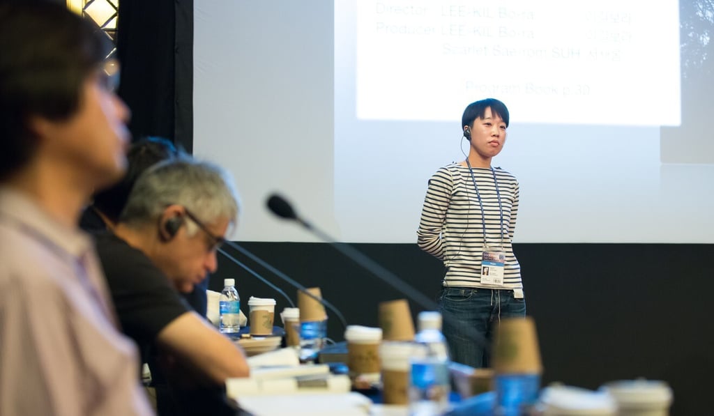 Lee-kil Bora giving a presentation about Untold in 2016. Photo: Docs Port Incheon