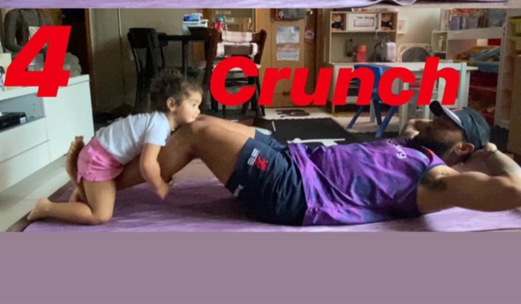 Jo Tuisoso showcasing a plank with his daughter, Cassidy Jade, on his back. Jo Tuisoso showcasing a plank with his daughter, Cassidy Jade, on his back.