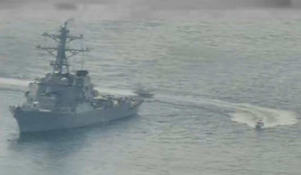 A US Navy photo shows Iranian Islamic Revolutionary Guard Corps Navy (IRGCN) vessels near the guided-missile destroyer USS Paul Hamilton (DDG 60) and other US military ships in the Gulf. Photo: AFP A US Navy photo shows Iranian Islamic Revolutionary Guard Corps Navy (IRGCN) vessels near the guided-missile destroyer USS Paul Hamilton (DDG 60) and other US military ships in the Gulf. Photo: AFP