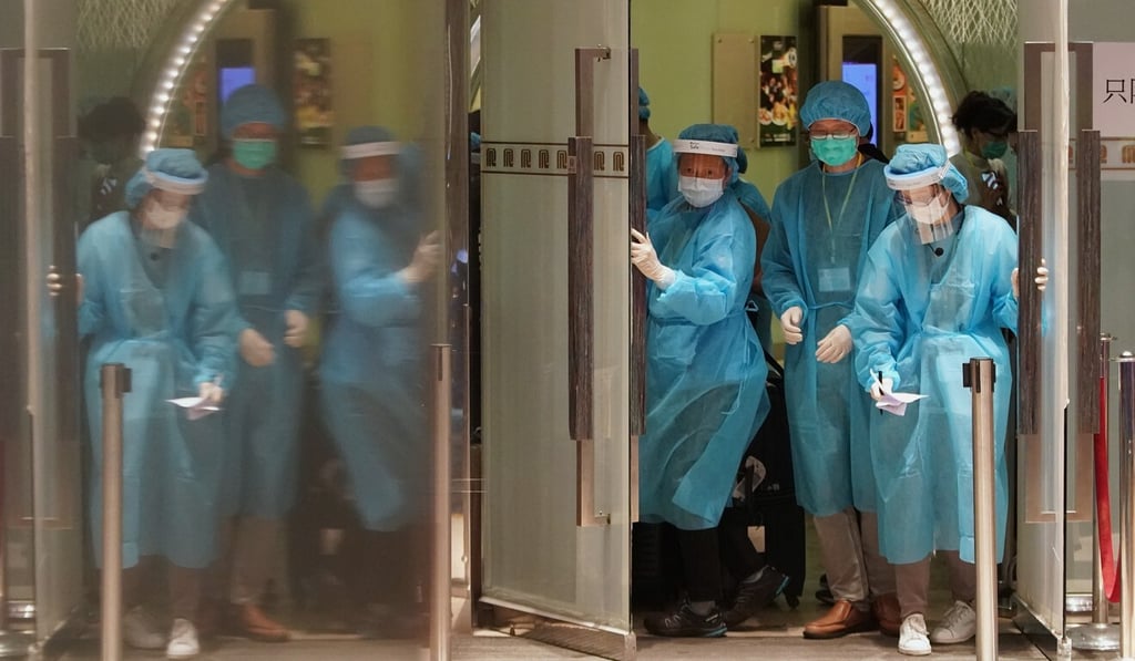 Staff at the Regal Oriental Hotel in protective gear. Photo: Felix Wong