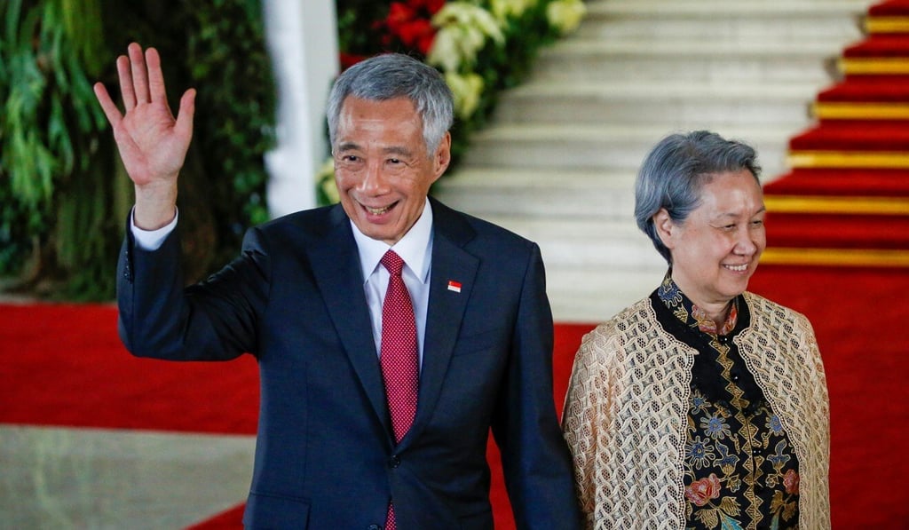 Singapore’s Prime Minister Lee Hsien Loong with his wife Ho Ching after attending the inauguration of Indonesia's President Joko Widodo in 2019. Photo: Reuters