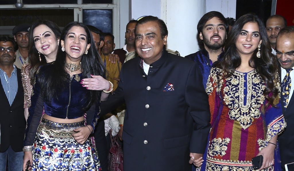 Mukesh Ambani and his family – wife Nita Ambani (back left), daughter Isha Ambani (right), son Anant Ambani and Radhika Merchant (front left), arrive to attend the wedding of Bollywood actress Priyanka Chopra and Nick Jonas. Photo: AP Photo